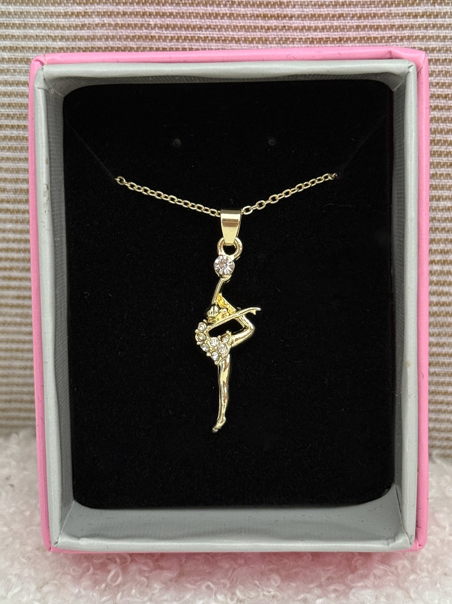 Collar gimnasta con cristales color oro