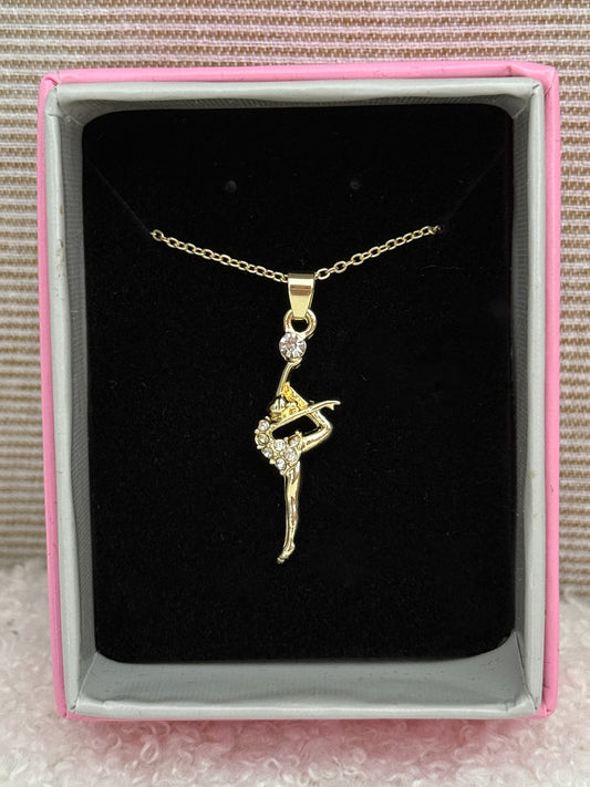 Naszyjnik gimnastyczka z kryształkami kolor złoty