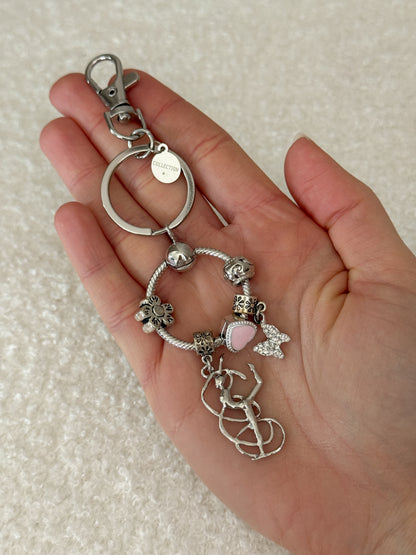 Llavero gimnasta charm